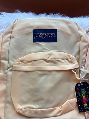 Jansport White Backpack with Blue Floral Pattern